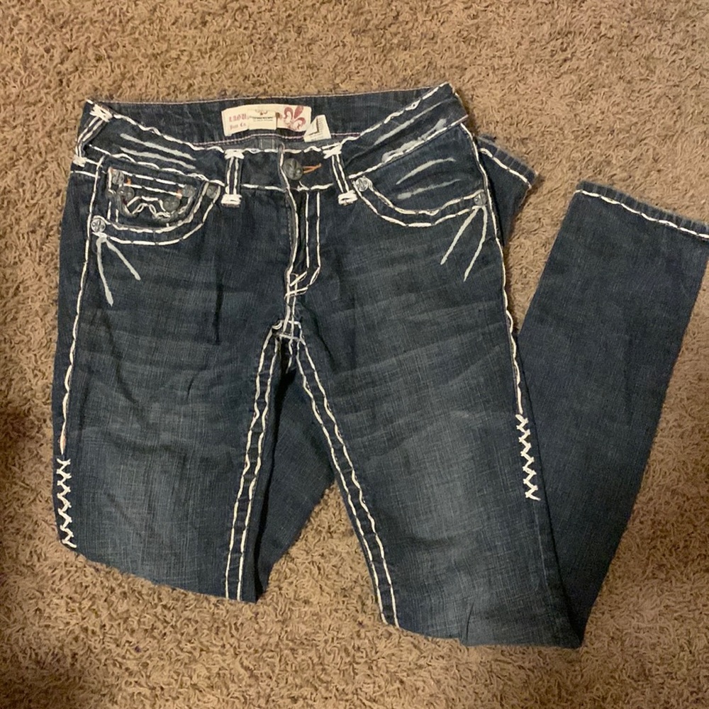 Size 27 Laguna Beach Jean Co. dark wash jeans with sewn detail